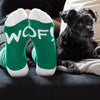 Dances with WOOFS Socks - styled photo showing "WOOF!" on bottom of socks next to black dog